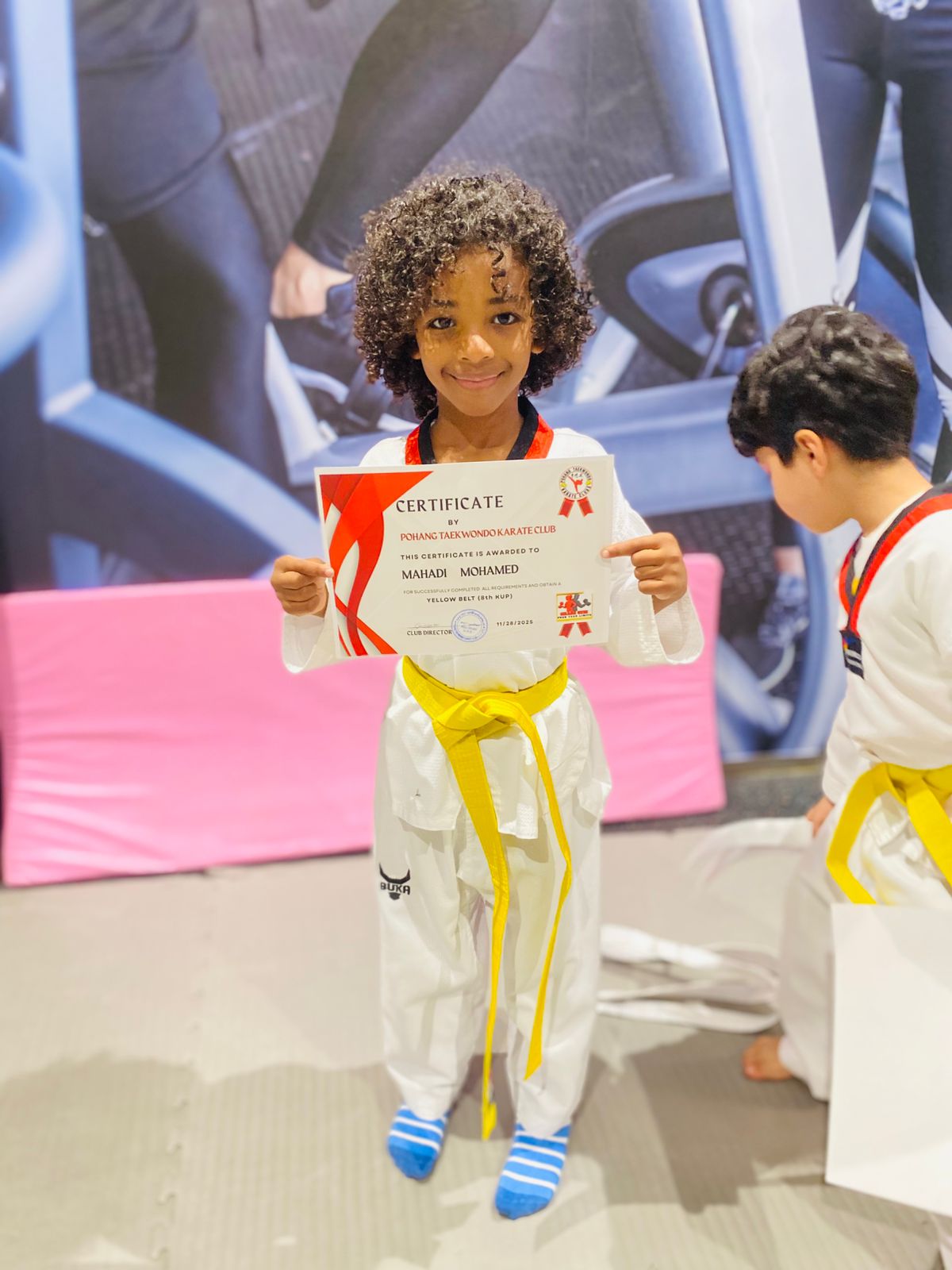 Student with Certificate